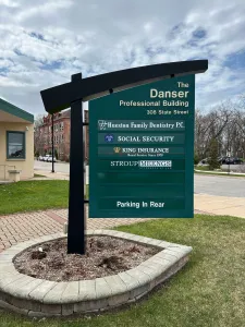 The Danser Professional Building sign with tenant list and parking info